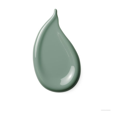 A green drop of paint on a white surfaceの素材