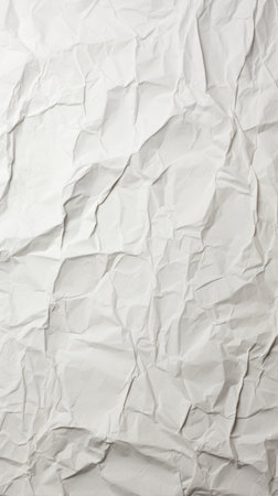 A close up of a sheet of white paper, off white crumpled paper texture, background.の素材
