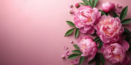 A bunch of pink flowers on a pink surface. Digital colorful wallpaper with copy-spaceの素材