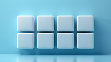 A group of white cubes sitting on top of a blue surfaceの素材