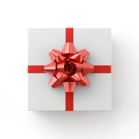 A white gift box with a red bowの素材