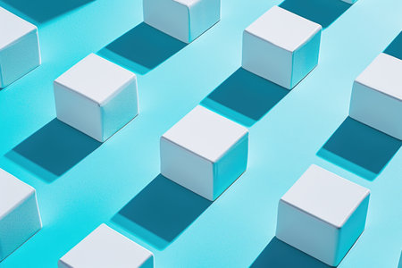 A group of white cubes sitting on top of a blue surfaceの素材