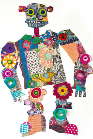 A robot made out of scrap paper and buttonsの素材