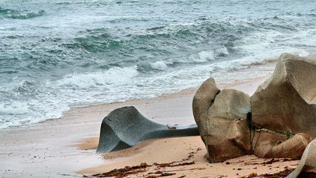 Ocean Waves Crashing on Rocky Beach with Unique Rock Formations near Porto in Portugalの写真素材