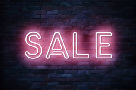 Neon SALE Sign on Brick Wall Background for Advertising and Promotionsの素材