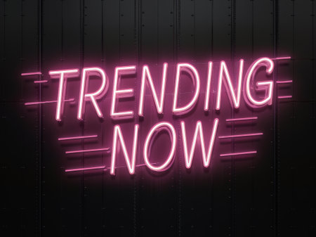 Trending Now Neon Signboard, Glowing Pink LED Text Display for Modern Design, Social Media Graphics, Marketing Campaignsの素材
