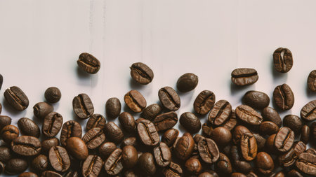 Close-Up of Coffee Beans on White Background Highlighting Texture and Detailの素材