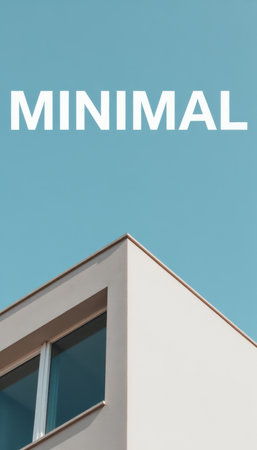 Minimalist architecture featuring a modern building corner with a clean design, a single window, and a clear blue sky. Text "MINIMAL" is displayed prominently above.の素材