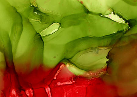 Abstract raster red and green mixing.Abstract raster red and green mixing.Colorful background hand drawn with bright inks and watercolor paints. Color splashes and splatters create uneven artistic modern design.の写真素材