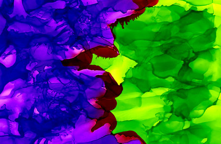 Light green paint and purple.Colorful background hand drawn with bright inks and watercolor paints. Color splashes and splatters create uneven artistic modern design.の写真素材