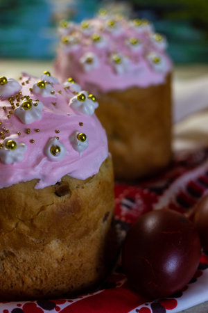 Several Kulich, a traditional Easter bread with meringue and colorful sprinkles