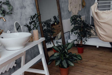 Bathing Room Interior Design. Cozy Empty Modern Bathroom Background With White Bathtub And Panoramic Windowsの写真素材
