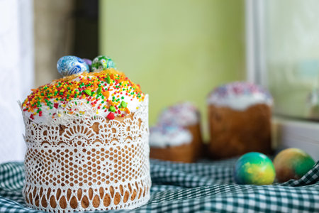 Traditional Easter cake with glace icing and painted easter eggs.Rustic style. Easter arrangement.の写真素材