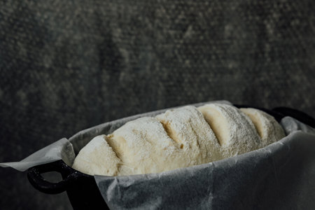 Raw bread dough in the mold ready for bakingの写真素材