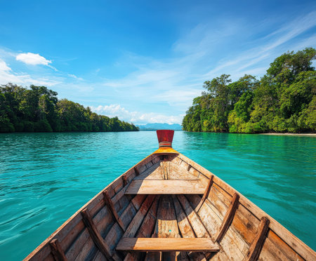 Tranquil boat ride through tropical waters and lush greenery.