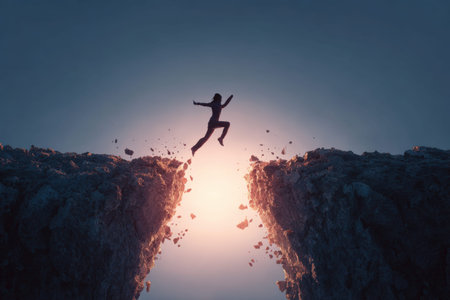 Courageous leap of a person jumping across a gap to overcome challenges at dusk.