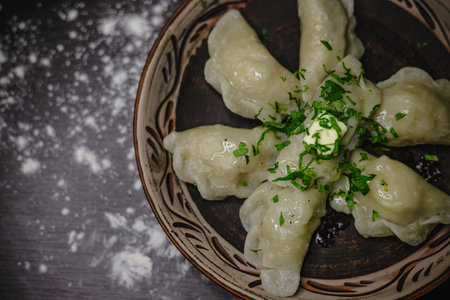 Delicious homemade dumplings with fresh herbs and butter.