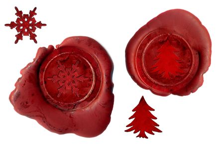 Two real wax seals with christmas icons (hi-res photos, no rendered images)の写真素材
