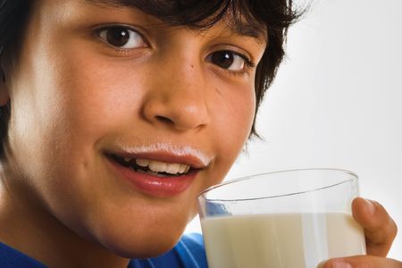 Boy with a milk mustacheの写真素材