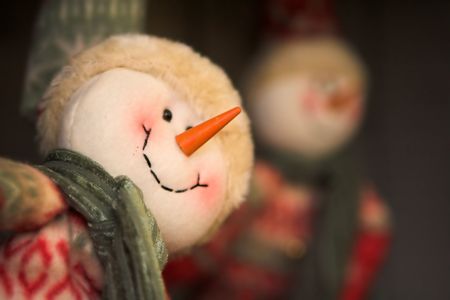 Funny christmas figurine with carrot noseの写真素材
