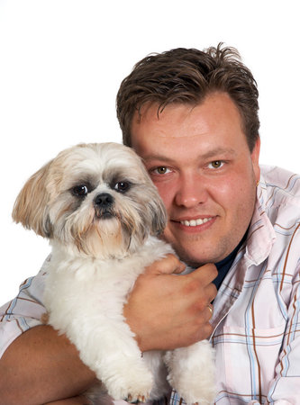 Portrait of a man and his little Shih-tzu dog