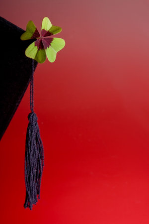 Good luck cloverleaf on a graduation hatの写真素材