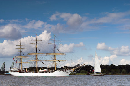 Three-masted ancient ship on parade on the river Scheldt during the 50th Tall Ships Race in Antwerp,...