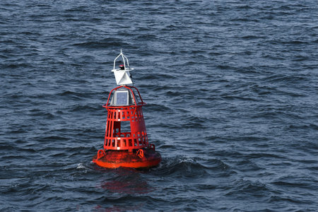 Red buoy at sea