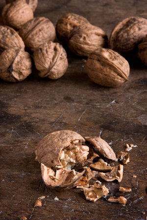 Closeup of a broken walnut on an antique table