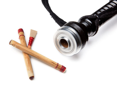 Authentic bagpipe reeds and bagpipe isolated on white