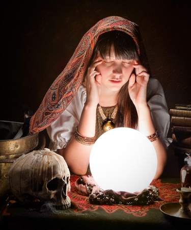 Diviner predicting the future with a crystal ballの写真素材