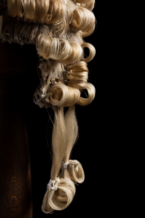 Braids or ponytails at the end of an antique horsehair judge or barrister wigの写真素材
