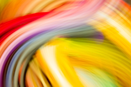 Colorful paper strips in motion photographed without digital manipulationの写真素材