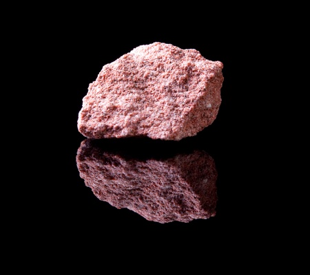 Uncut rock piece of sandstone a sedimentary rock composed of sand-sized mineralsの写真素材