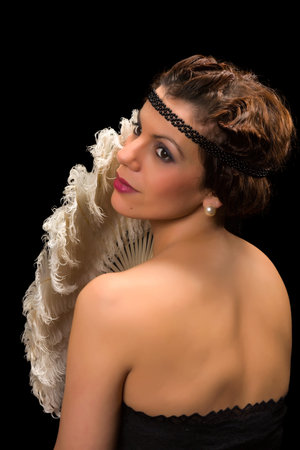 Glamour style vintage 1920 actress posing like a diva