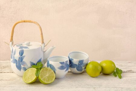 Citrus fruit still life against a grunge textured backgroundの写真素材