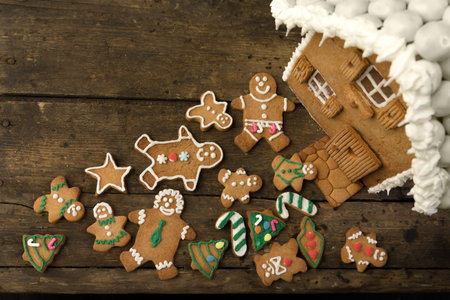 Assortment of gingerbread cookies on a rustic wooden table
