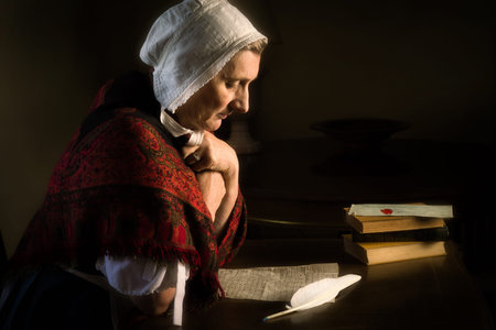 Rembrandt style or Renaissance portrait of a woman writing a letter with a feather quill