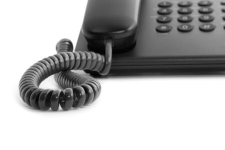 Real business tool: isolated  black office phone with copyspaceの写真素材