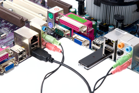 Wired media hardware: motherboards with cord and usb driveの写真素材