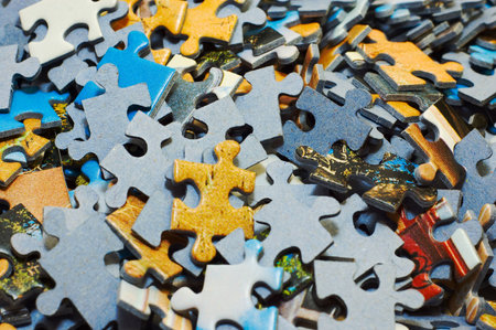 Task too difficult: pile of jigsaw puzzle pieces