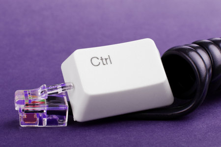 Communication control: censorship concept made of phone cord and control key