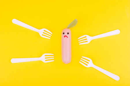 Being tasty is dangerous: sausage surrounded by enemy forks