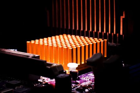 Power energy source concept. Circuit board with light spotの写真素材