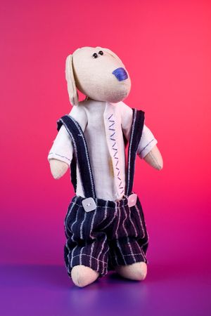 Puzzled doggy toy on color backgroundの写真素材