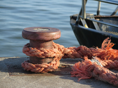 mooring bitt with a ropeの写真素材