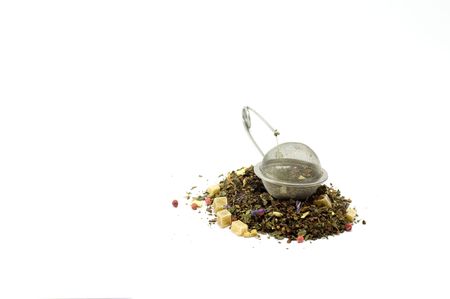 Green tea and seive for drinking teaの写真素材