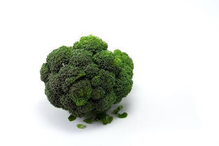 Green fresh broccoli on the white backgroundの写真素材