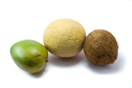 Mango, melon anf coco in the white backgroundの写真素材