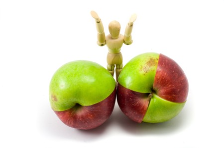 Mixed red and green apples on the white backgroundの写真素材